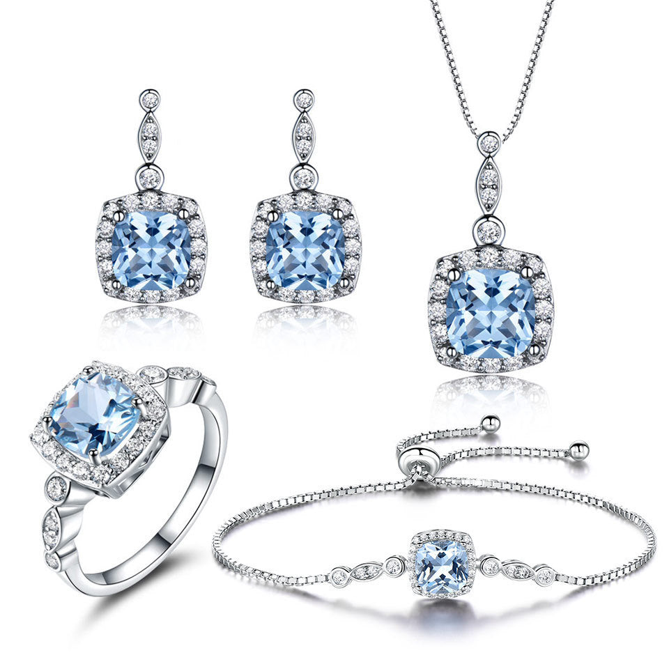 "BlueAura" Set – 4-teiliges Edelstahl-Schmuckset mit hellblauem Stein